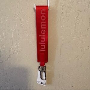 Lululemon Never Lost Keychain Word Mark  NWT authentic Lulu Red/White